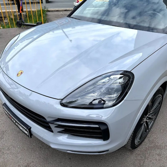 Оклейка Porsche Cayenne Coupe автомобиля винилом в Sunmax Nardo Grey