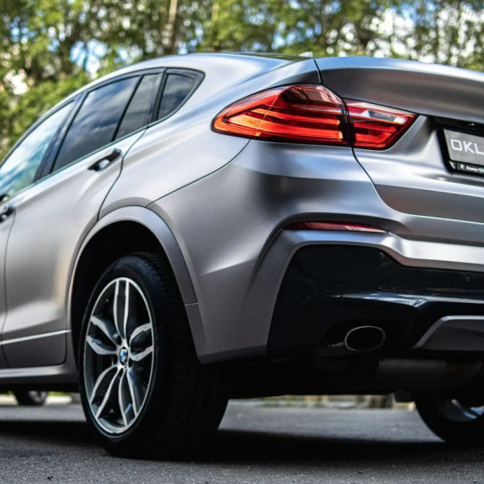 Оклейка BMW X4 в Sunmax Matte Metallic Gunme на авто винилом