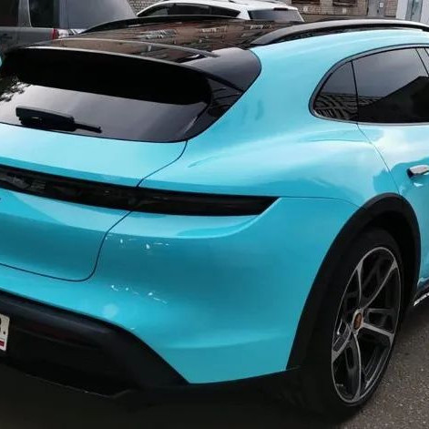 Оклейка Porsche Taycan 4S в Sunmax Color Ultra Gloss Sky Blue авто глянцевым винилом