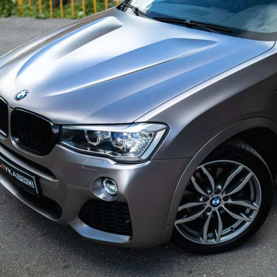 Оклейка BMW X4 в Sunmax Matte Metallic Gunme на авто винилом