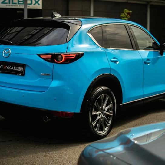 Оклейка авто виниловой пленкой Mazda в Sunmax Ultra Gloss Ice Blue