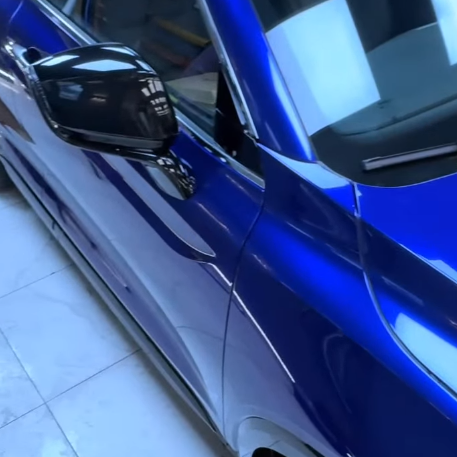 Оклейка автомобиля Geely в цветной полиуретан Sunmax 17 Marina Blue Pearl PPF