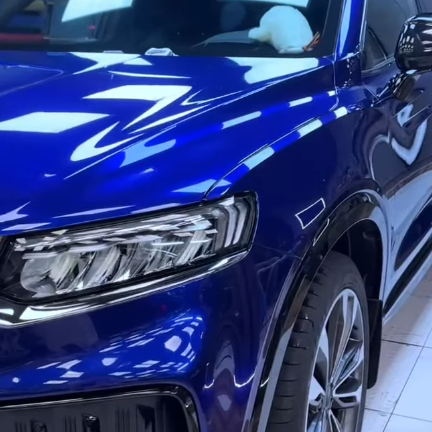 Оклейка автомобиля Geely в цветной полиуретан Sunmax 17 Marina Blue Pearl PPF