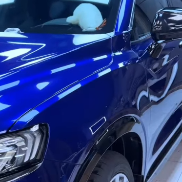Оклейка автомобиля Geely в цветной полиуретан Sunmax 17 Marina Blue Pearl PPF
