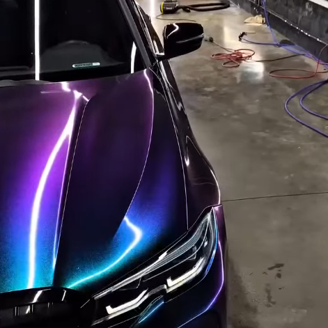 Покрытие кузова BMW цветным полиуретаном Sunmax 29 Green Purple PPF