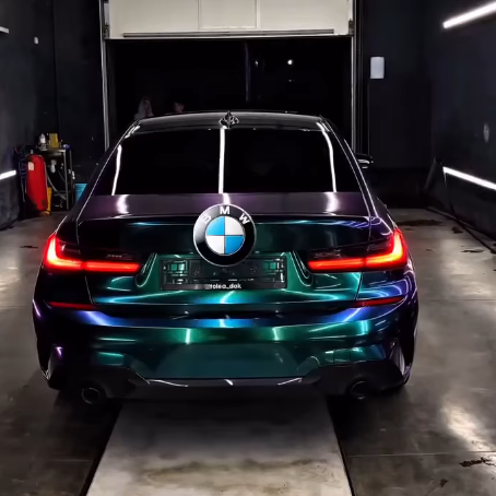 Покрытие кузова BMW цветным полиуретаном Sunmax 29 Green Purple PPF