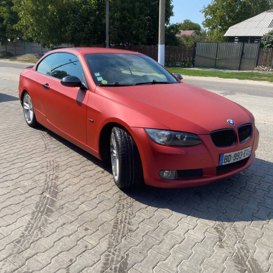 Оклейка BMW в цветную виниловую Sunmax 746 Ghost metallic Poppy Red