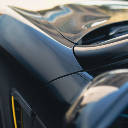 Оклейка Porsche Panamera в цветной полиуретан Sunmax 38 Black Gloss Color PPF