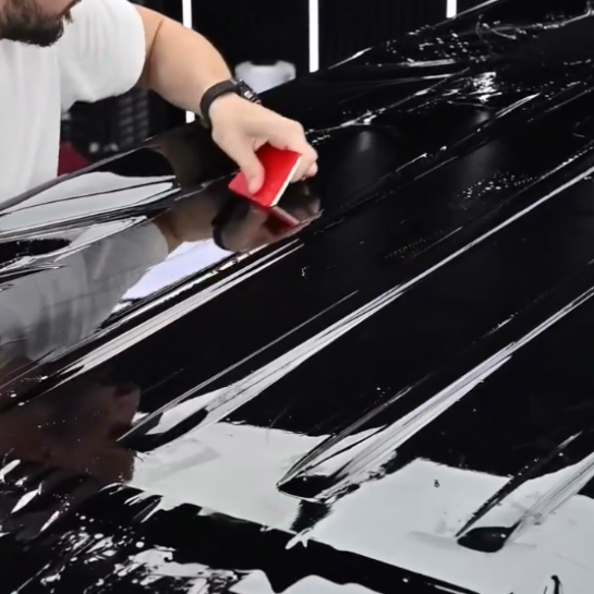 Оклейка GMC полиуретаном Sunmax 38 Black Gloss Color PPF