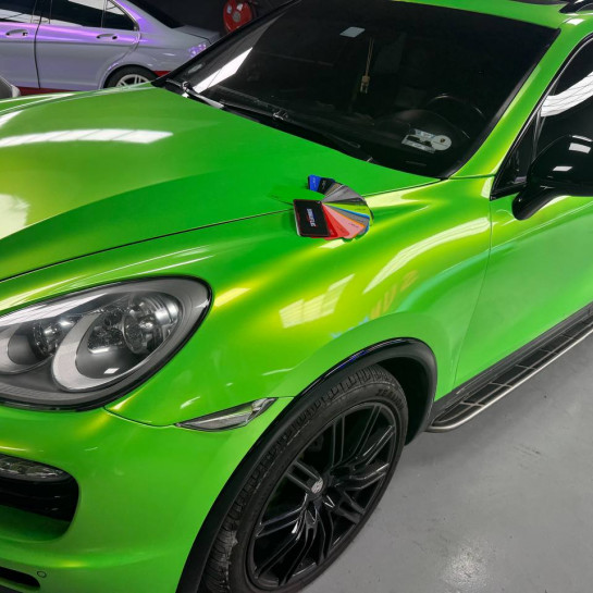 Оклейка Porsche автовинилом Sunmax 350 Coral Apple Green