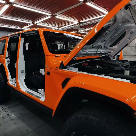 Оклейка Jeep Wrangler защитным полиуретаном Sunmax 6 Lotus Orangе Color PPF 