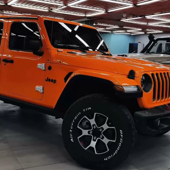 Оклейка Jeep Wrangler защитным полиуретаном Sunmax 6 Lotus Orangе Color PPF 