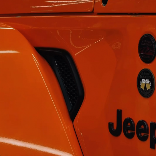 Оклейка Jeep Wrangler защитным полиуретаном Sunmax 6 Lotus Orangе Color PPF 