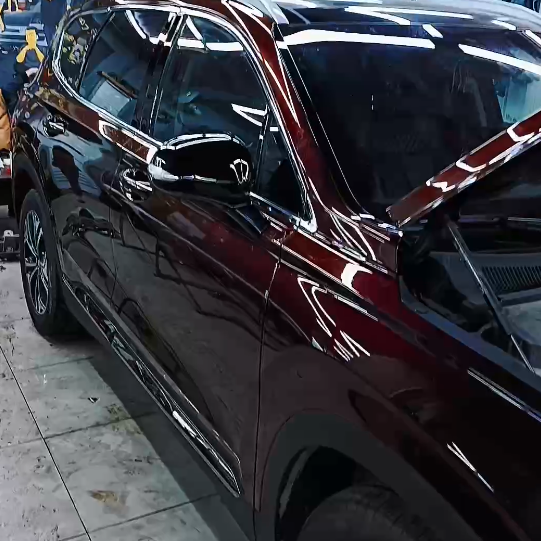Оклейка Hyundai цветным антигравийным полиуретаном Sunmax 18 Black Red Pearl PPF