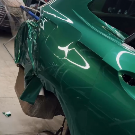 Оклейка Opel Astra цветным полиуретаном Sunmax 49 BMW Green PPF