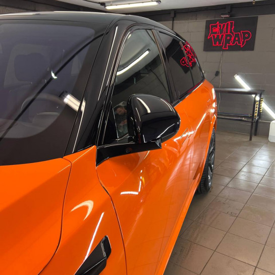 Оклейка кузова автомобиля Li оранжевым полиуретаном от Sunmax