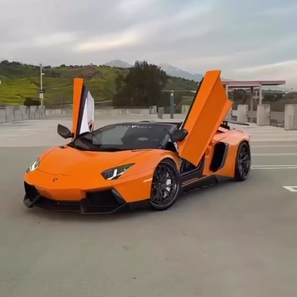 Оклейка Lamborghini защитной полиуретаном Sunmax 6 Lotus Orange PPF