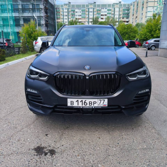 Оклейка BMW X5 черным полиуретаном Sunmax 26 Black Matt PPF