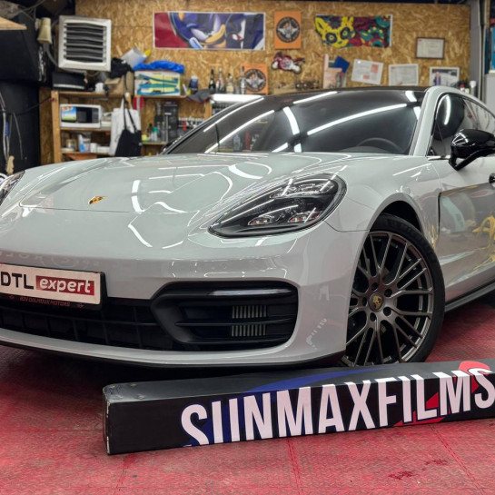 Оклейка кузова Porsche полиуретановой цветной пленкой Sunmax 13 Volcano Gray Gloss