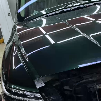 Оклейка Hyundai Genesis полиуретановой пленкой Sunmax 55 Tesla Forest Green
