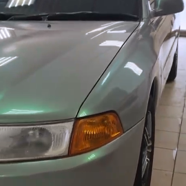 Оклейка кузова Mitsubishi цветной полиуретановой пленкой Sunmax 10 Lime Gray PPF