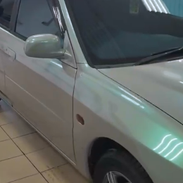 Оклейка кузова Mitsubishi цветной полиуретановой пленкой Sunmax 10 Lime Gray PPF