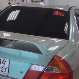 Оклейка кузова Mitsubishi цветной полиуретановой пленкой Sunmax 10 Lime Gray PPF