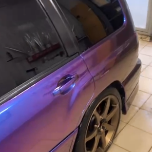 Оклейка Subaru Forester цветной полиуретановой пленкой Sunmax 30 Green Blue PPF