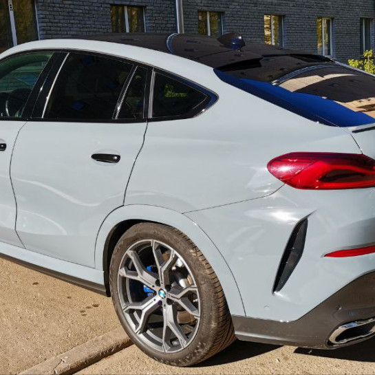 Оклейка BMW X6 автовинилом Sunmax оттенка Gloss Nardo Grey