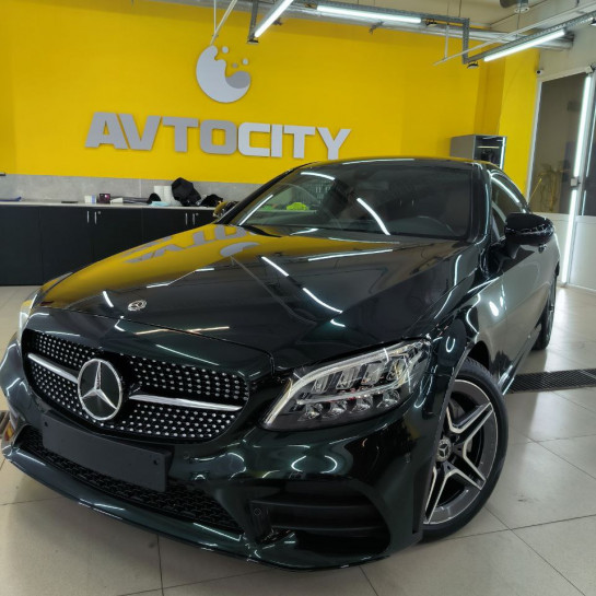 Оклейка Mercedes защитным полиуретаном Sunmax цвета 4 Goodwood Green Pearl PPF 
