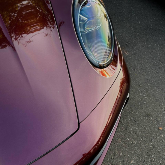 Оклейка Porsche цветным полиуретаном Sunmax 51 Jaguar Black Rose PPF