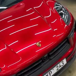 Оклейка Porsche полиуретановой пленкой Sunmax 48 Metal Red PPF