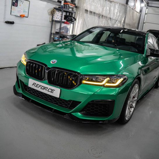 Оклейка BMW полиуретановой защитной пленкой Sunmax оттенка 49 BMW Green PPF