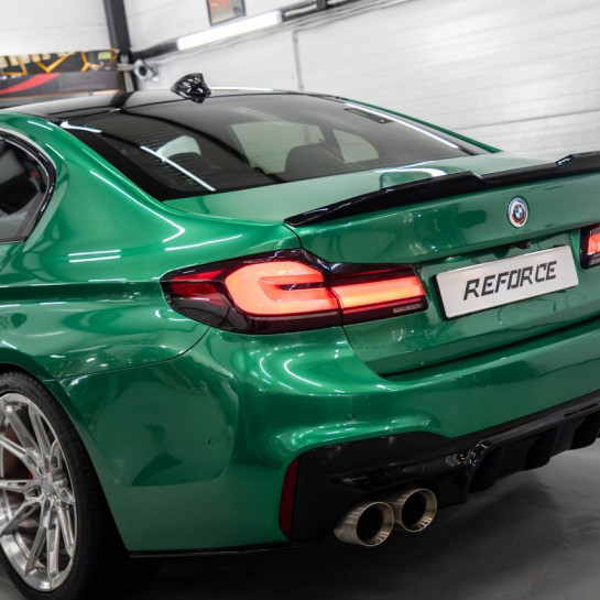 Оклейка BMW полиуретановой защитной пленкой Sunmax оттенка 49 BMW Green PPF