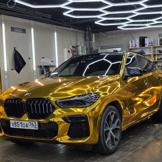 Оклейка BMW полиуретановой пленкой Sunmax 62 Super Chrome Gold PPF