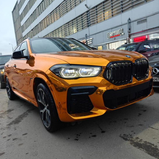 Оклейка BMW полиуретановой пленкой Sunmax 62 Super Chrome Gold PPF