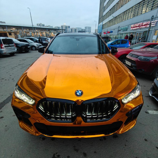 Оклейка BMW полиуретановой пленкой Sunmax 62 Super Chrome Gold PPF