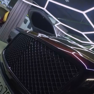 Оклейка Bentley цветной полиуретановой пленкой Sunmax 18 Black Red Pearl PPF