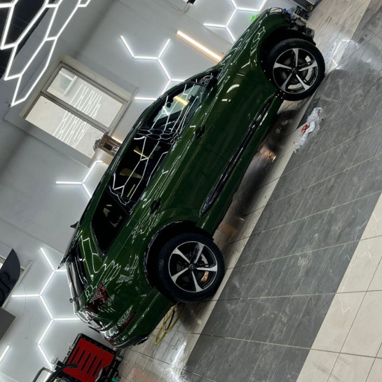 Оклейка Audi полиуретаном Sunmax оттенка 139 Sonoma Green PPF