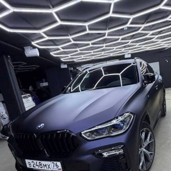 Оклейка BMW X6 цветным полиуретаном Sunmax 108 Matt Metal Black Blue PPF