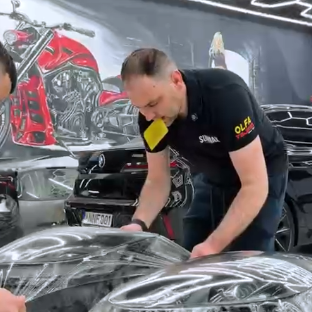 Оклейка фар Porsche антигравийной полиуретановой пленкой Sunmax PPF