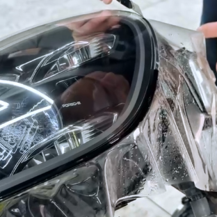 Оклейка фар Porsche антигравийной полиуретановой пленкой Sunmax PPF