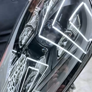 Оклейка фар Porsche антигравийной полиуретановой пленкой Sunmax PPF