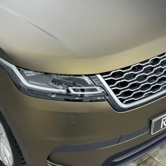 Оклейка Range Rover полиуретаномвой пленкой Sunmax 122 Matt Metal Shadow Gold PPF