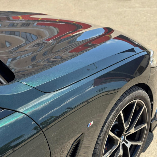 Оклейка BMW полиуретановой цветной пленкой Sunmax 4 Goodwood Green Pearl PPF