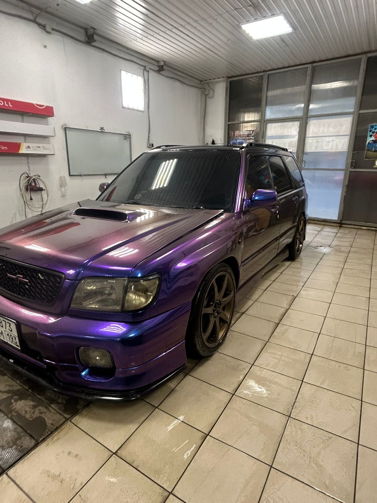 Оклейка Subaru Forester полиуретаном Sunmax 30 Green Blue PPF
