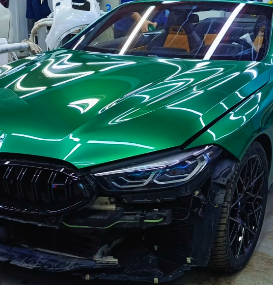 Оклейка BMW цветной полиуретановой пленкой Sunmax 49 BMW Green Color PPF