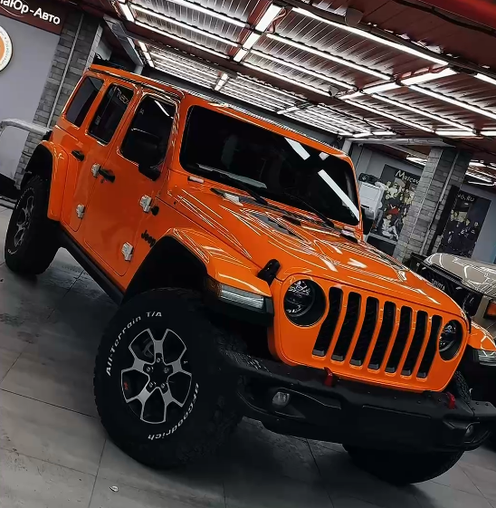 Оклейка Jeep Wrangler цветным полиуретаном Sunmax 6 Lotus Orangе Color PPF 